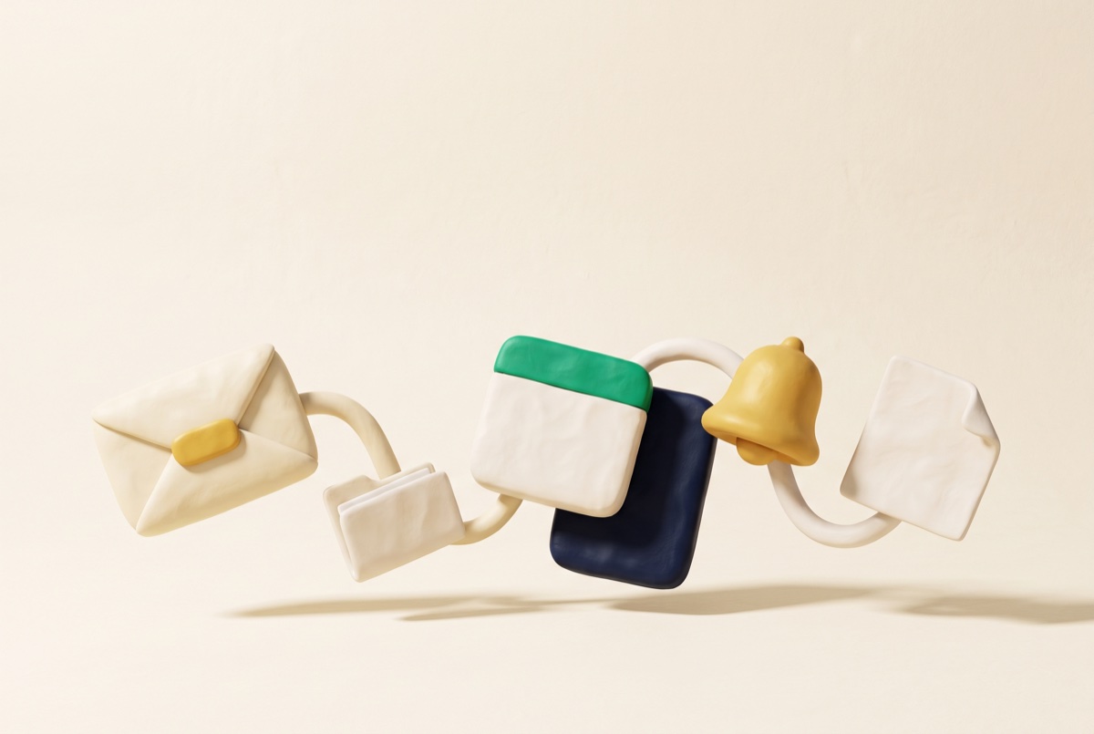 Objets de bureau en pâte à modeler reliés entre eux par des tubes souples, sur fond crème